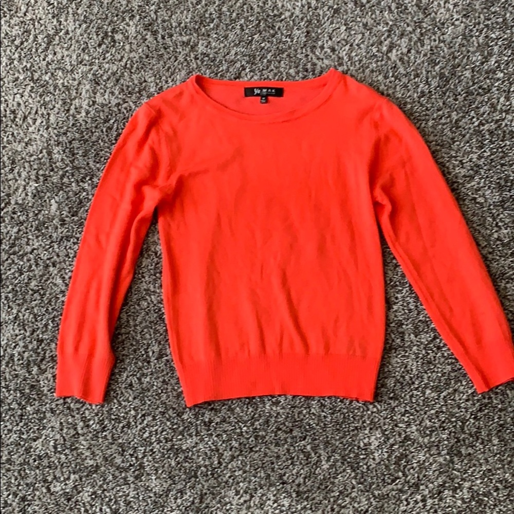Bright red sweater